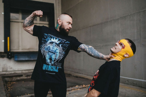 Arrival T-Shirt Any Means Necessary Clothing